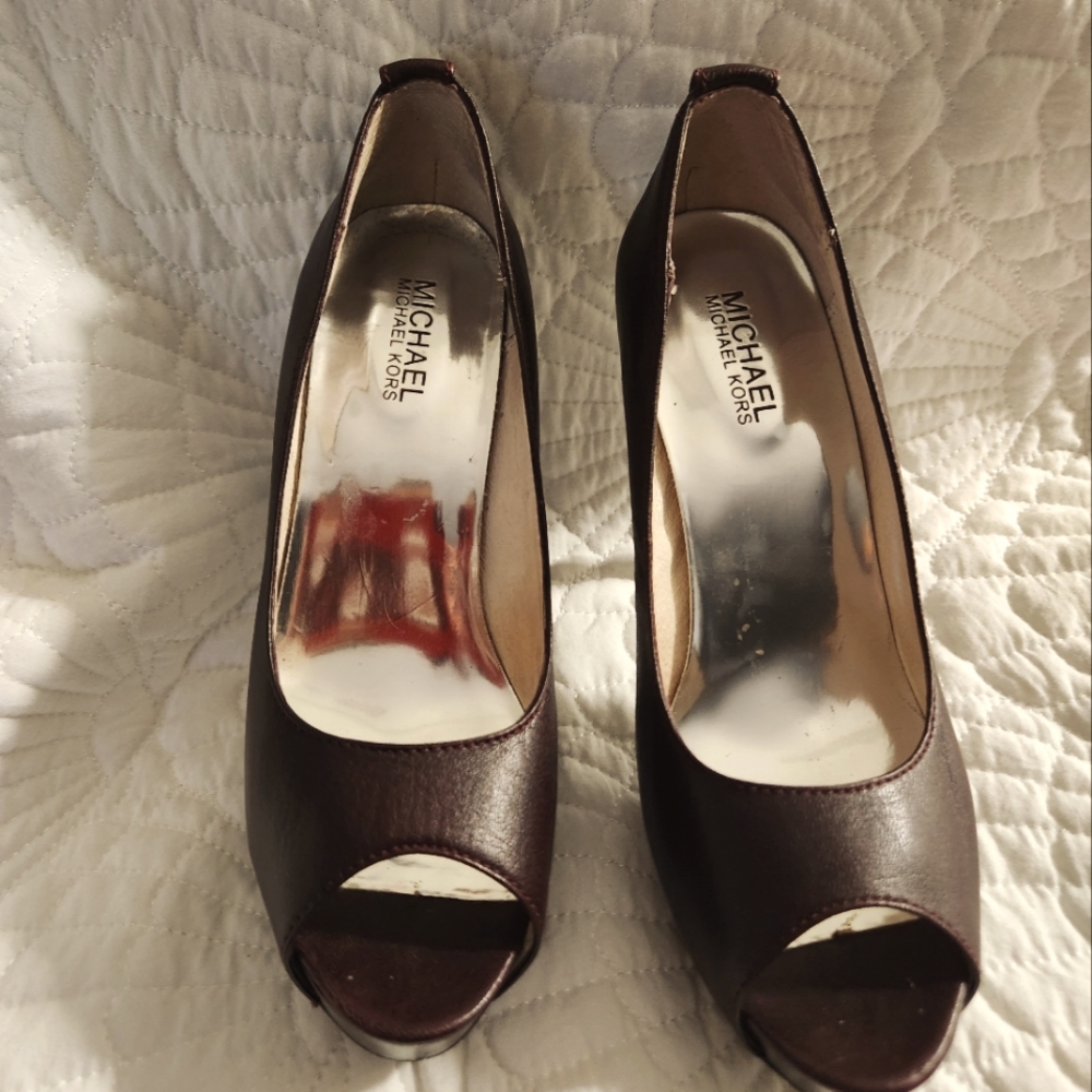 Michael kors brown genuine leather.